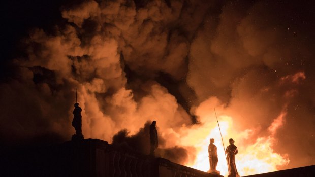 How much did we care? Flames engulf the 200-year-old National Museum of Brazil in Rio de Janeiro last September.