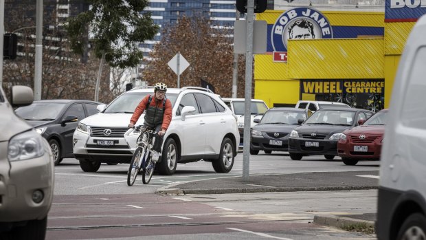 A cyclist negotiates the dreaded  Haymarket roundabout. 