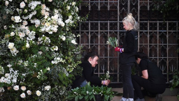 Flower arrangers do last-minute preparations within Windsor Castle ahead of the royal wedding ceremony of Britain's Prince Harry and Meghan Markle.