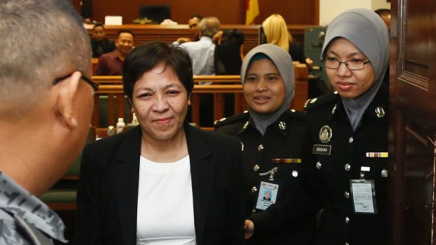 Australian Maria Elvira Pinto Exposto leaves her hearing at the Shah Alam High Court after being found not guilty last year.