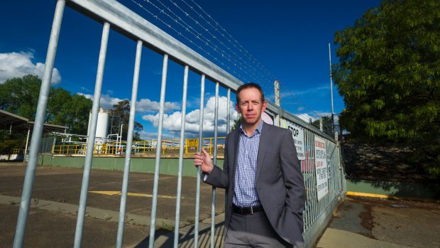 Shane Rattenbury stands outside the proposed Capital Recycling Solutions site. 
