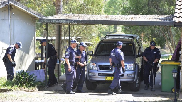 Police conduct a search of the property in Oakville, north-west Sydney, where Detective Inspector Bryson Anderson was fatally stabbed.