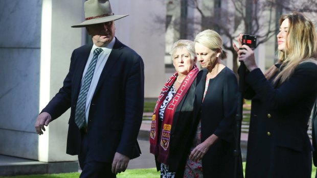 Joyce (left) and his media adviser Campion (right) seen arriving for a Canberra press conference in June 2017.
