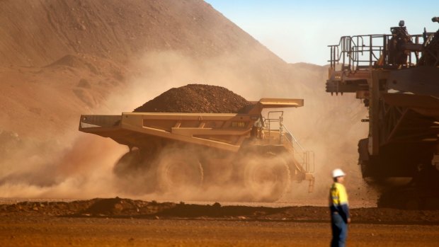 The world's fourth-largest iron ore miner reported a full-year statutory net profit of $878 million.