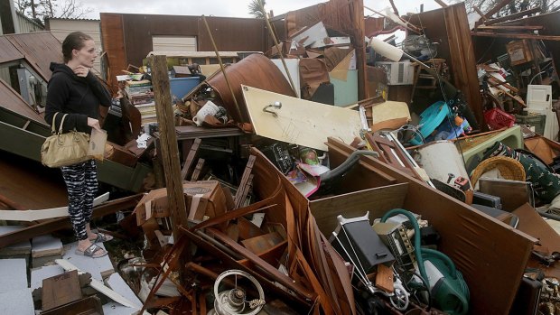 Haley Nelson inspects damage to her family properties in Florida after Hurricane Michael made landfall on October 10.