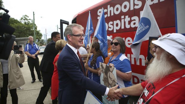 Opposition Leader Michael Daley gets a warm reception from HSU members at Nepean Hospital on Friday.