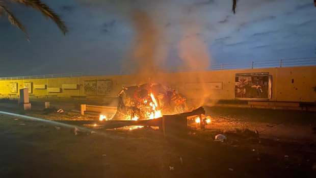 A burning vehicle at the Baghdad International Airport following an air strike the US said was ordered to kill Qassem Soleimani.