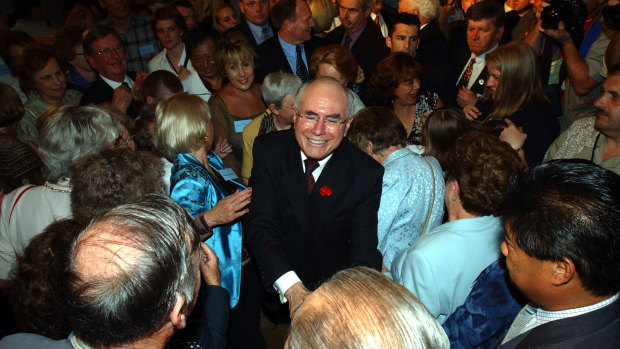 John Howard celebrates his 2001 election victory. 