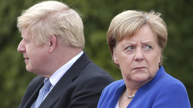 30 days: German Chancellor Angela Merkel welcomes Britain's Prime Minister Boris Johnson for a meeting at the Chancellery in Berlin.
