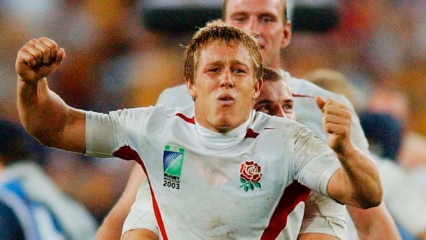 England's glory: Jonny Wilkinson is grabbed by Ben Cohen as England celebrate their Rugby World Cup win over Australia in 2003.