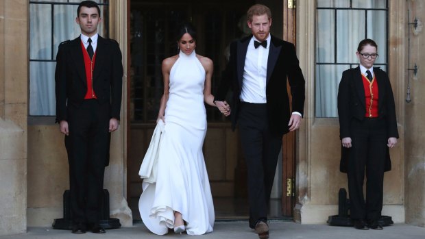The newly married Duke and Duchess of Sussex, Meghan Markle and Prince Harry, attend an evening reception at Frogmore House following their wedding.