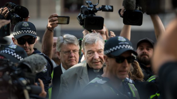 George Pell arrives at the County Court on Wednesday.