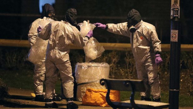 Investigators in protective suits at the scene of the nerve agent attack in Salisbury, England.