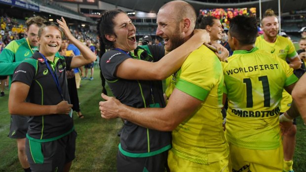 Stannard is congratulated by women's sevens star Charlotte Caslick after the men won the Sydney Sevens on January 28.