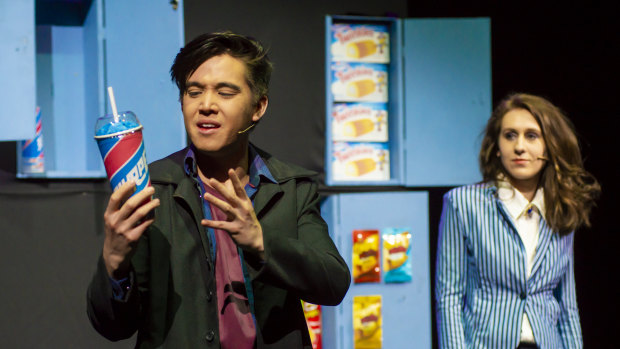 Will Huang ( J.D.), left,  and Belle Nicol (Veronica Sawyer) in <i>Heathers the Musical</i>.