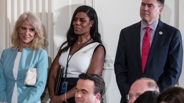 Adviser Kellyanne Conway (left) with former aide Omarosa Manigault and White House Communications Director Mike Dubke in April, 2017.