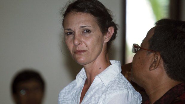 Australian Sara Connor listens to an Indonesian interpreter during her trial in Bali.