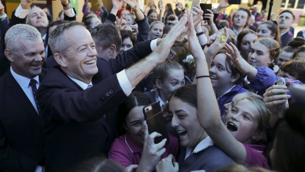 Bill Shorten was mobbed by students in Gosford on Monday. 