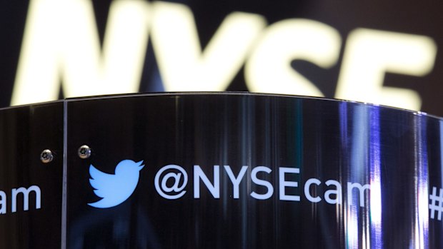 The Twitter bird logo on an updated phone post on the floor of the New York Stock Exchange. 