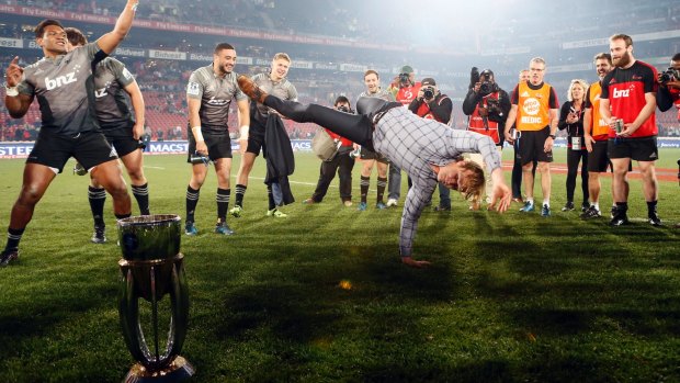 Busting a move: Crusaders coach Scott Robertson celebrates after beating the Lions at Ellis Park in the 2017 final. 