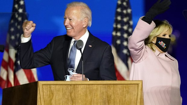 Democratic presidential candidate Joe Biden arrives with his wife, Jill Biden, to speak to supporters on Wednesday (AEDT) in Wilmington, Delaware.