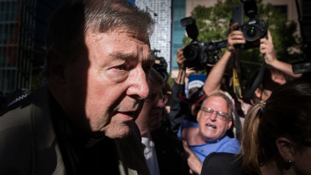 Cardinal George Pell arrives at the Melbourne County Court. 