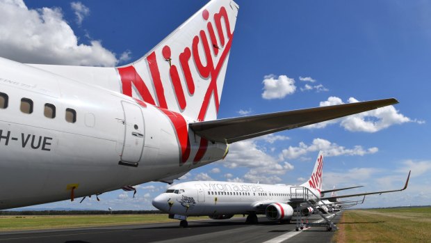 Grounded Virgin Australia aircraft parked at Brisbane Airport.