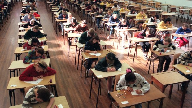 Students sit the selective schools test in 1997. The exam is to be revamped.