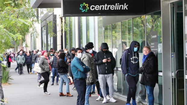 People lining up outside Centrelink. 