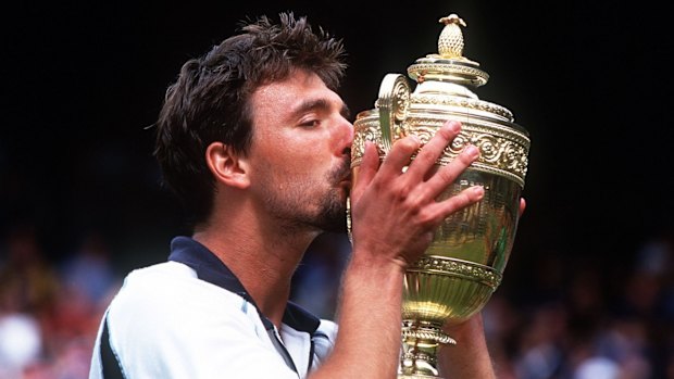 Memorable: Goran Ivanisevic celebrates after defeating Pat Rafter in the 2001 Wimbledon final.