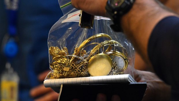 Suspected stolen gold found on a customer of Gold buyers Melbourne which was raided by the police.