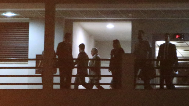 Former Brazilian president Michel Temer, centre, arrives at Federal Police headquarters in Rio de Janeiro.