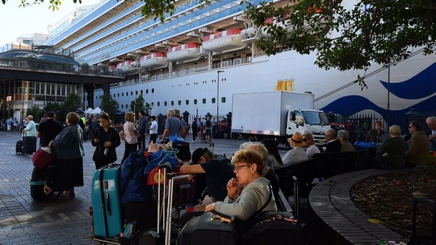 Passengers disembark from the Ruby Princess on March 19. 