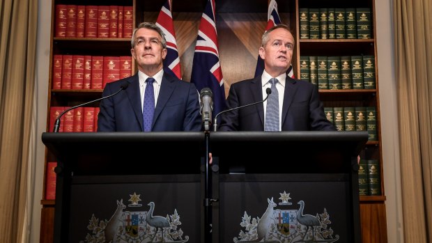 Sober suits: Shadow attorney-general Mark Dreyfus and opposition leader Bill Shorten in Canberra last month.