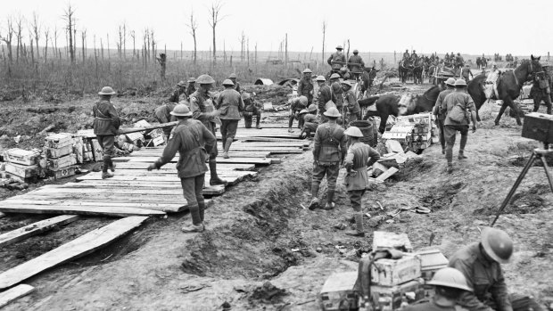 Members of the 2nd Australian Pioneer Battalion build a wagon track from planks at Chateau Wood during World War One.