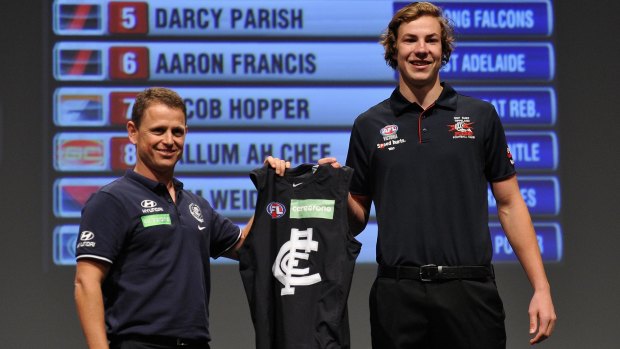 High hopes: Brendon Bolton welcomes Harry McKay to the Blues with pick 10 in the 2015 draft.