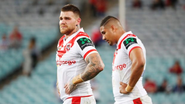 Down and out: Josh Dugan  and Nene Macdonald  after the Dragons lost to the Bulldogs in round 26 last season.
