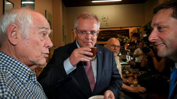 Scott Morrison and Matthew Guy with Pellegrini's co-owner Nino Pangrazio.