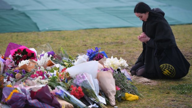 Flowers have been laid in Princes Park to remember Eurydice Dixon.