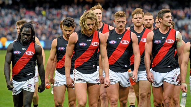 Dejected: Essendon players had a horror start to the season last year, something they don't want to repeat in 2019.