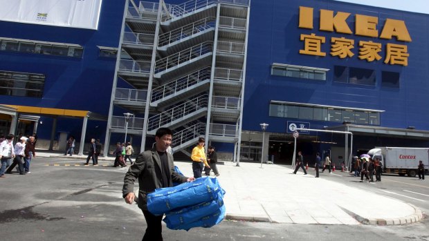 A customer leaves a Ikea store  in Shenyang, Liaoning.