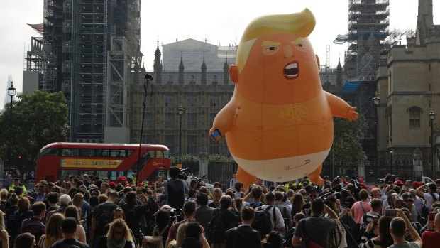 A six-metre high cartoon baby blimp of US President Donald Trump is flown as a protest against his 2018 visit to Britain.