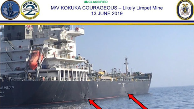 The US military's Central Command shows damage and a suspected mine on the Kokuka Courageous in the Gulf of Oman near the coast of Iran. 