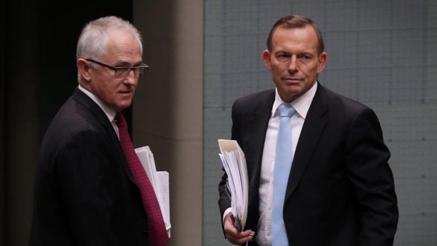 Prime Minister Malcolm Turnbull, left, highlighted his predecessor Tony Abbott's pledge.