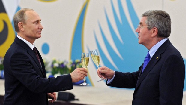 Russian President Vladimir Putin with IOC president Thomas Bach.
