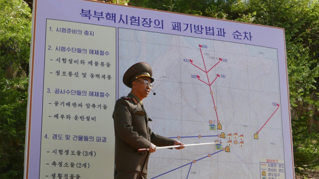 The Deputy Director of North Korea's Nuclear Weapons Institute, who would not give his name, briefs reporters about the dismantling of North Korea's nuclear test site, in Punggye-ri on Thursday.