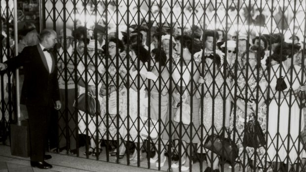 Shoppers queue outside Myer Melbourne for the 1958 Boxing Day sales.