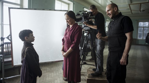 Director Ralph Fiennes (right) on the set of The White Crow. 