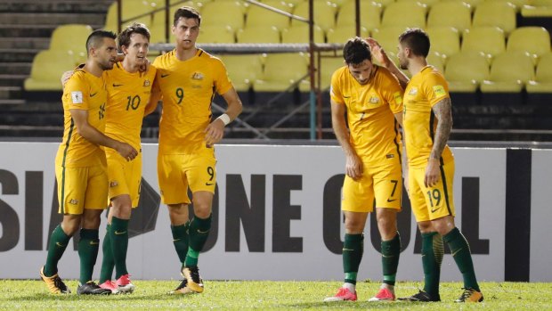 Australia celebrates scoring against Syria in their World Cup qualifying tie last year.