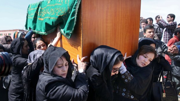 Afghan women carry the coffin of 27-year-old Farkhunda, beaten to death by a mob in 2015.